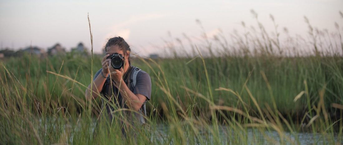 Photographer using the Nikon d7100 to get a picture in Cape Hattera, NC