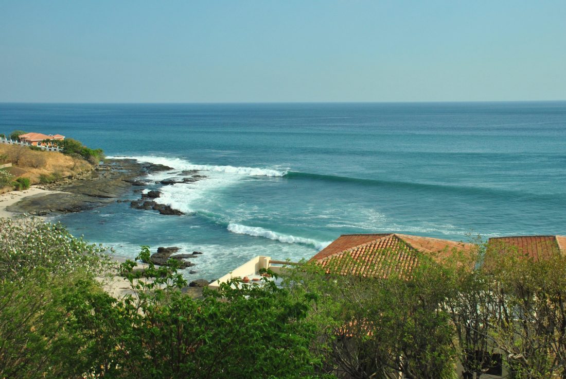 A left hand wave peels across the reef at Playa Rosadas in Nicaragua